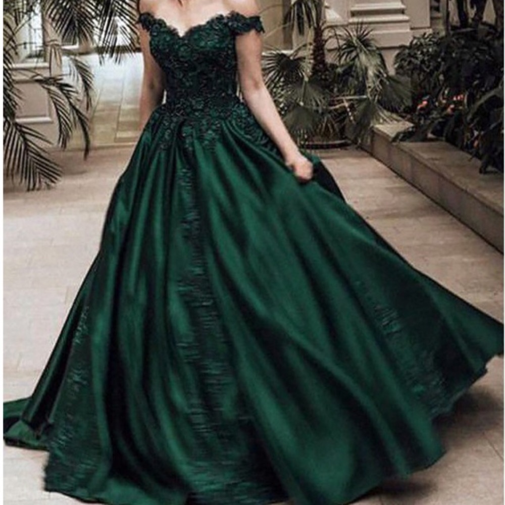Green ballroom gown with lace detail